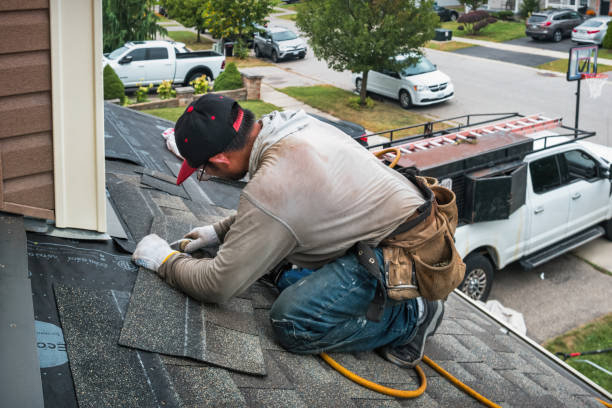 Professional Roof Replacement technician working in Fayetteville, TX